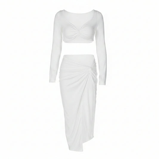 White long-sleeve top and skirt set on a white background